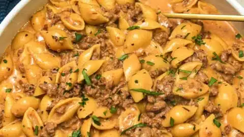 Creamy Beef and Shells Pasta plated with herbs and cheese