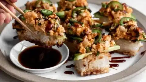 Crispy rice topped with a vibrant spicy shrimp salad