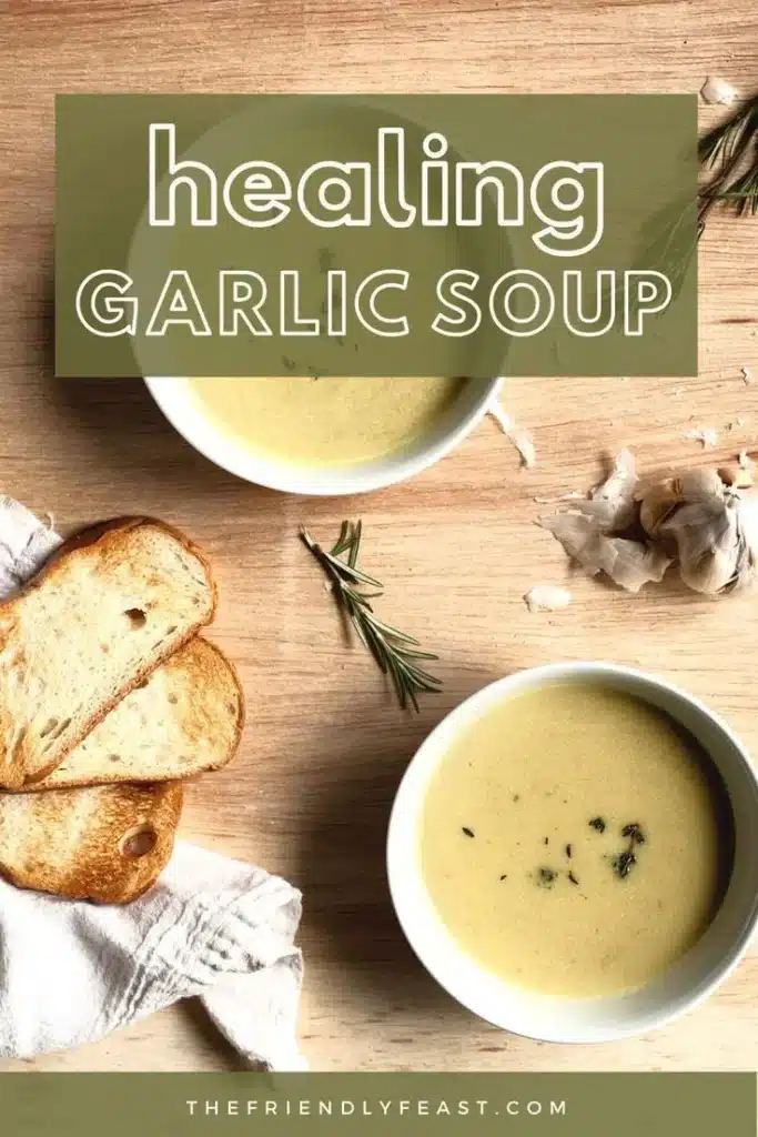 A steaming bowl of immune-boosting garlic soup garnished with fresh herbs.