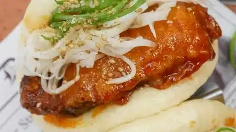 Delicious Korean Fried Chicken Bun with crispy chicken in a soft bun