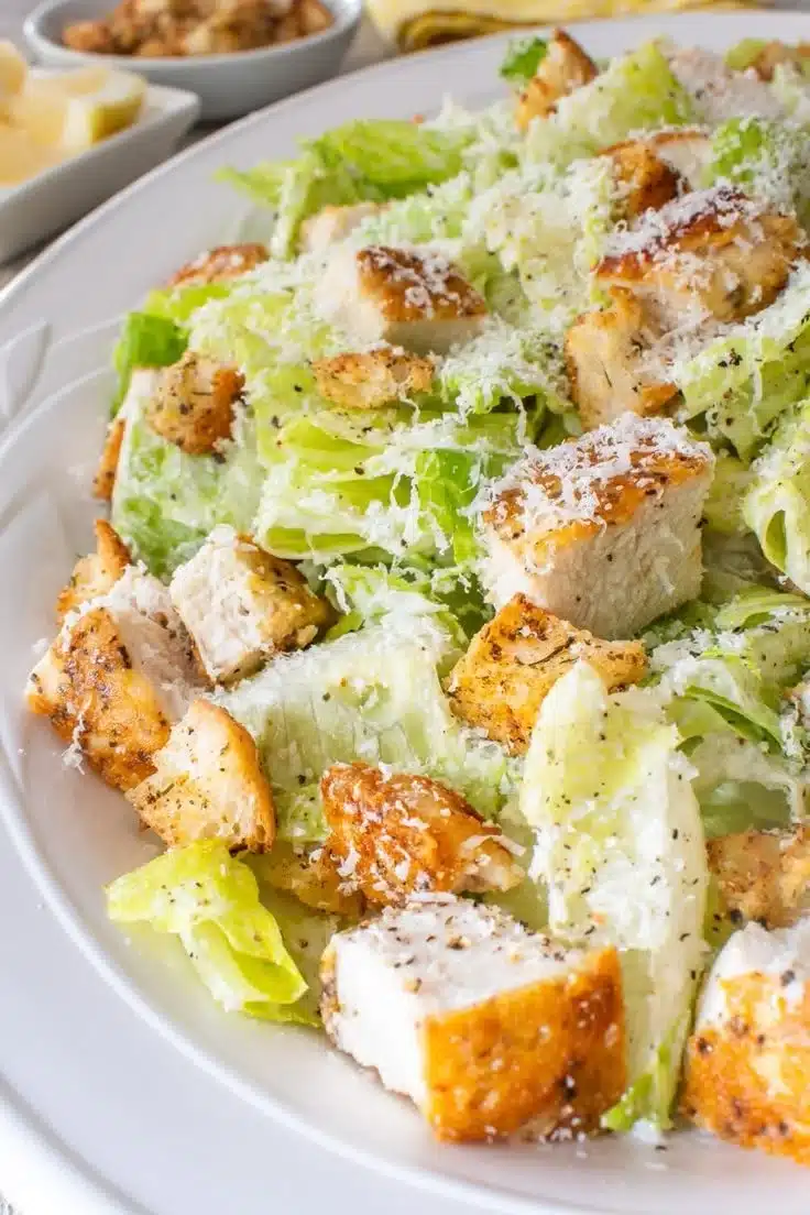Parmesan-Crusted Chicken Caesar Salad 1 Delicious Parmesan-Crusted Chicken Caesar Salad with fresh greens and croutons
